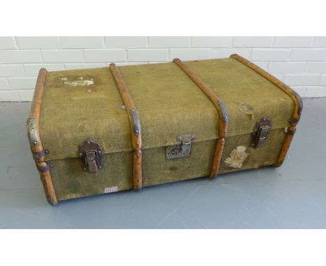 A vintage canvas bound travel trunk, 92 x 33cm