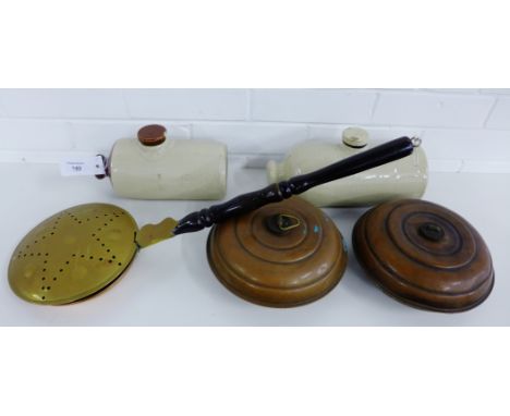 Two stoneware hot water pigs together with two copper hot water flasks and a copper bed warming pan (5) 