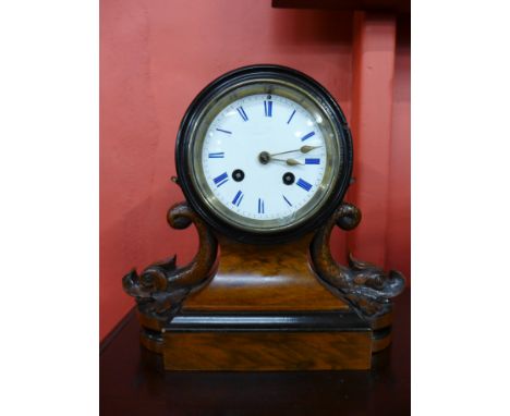 A 19th Century French walnut and ebonised drum cased 8-day mantel clock