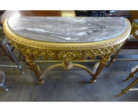 A reproduction French Louis XV style gilt console table