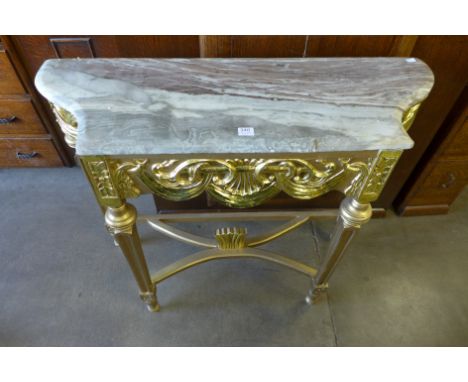 A reproduction French Louis XV style gilt console table