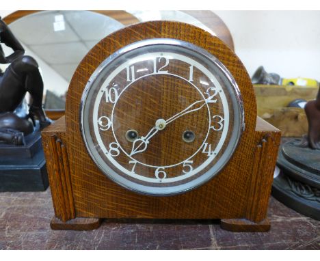An Enfield oak mantel clock