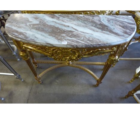 A reproduction French Louis XV style gilt console table