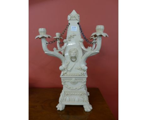 A ceramic candelabra centrepiece