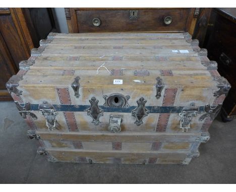 An American Recousie Trunks And Bags steamer trunk, made by Vogel Bros., New York