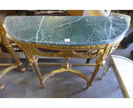 A reproduction French Louis XV style gilt console table