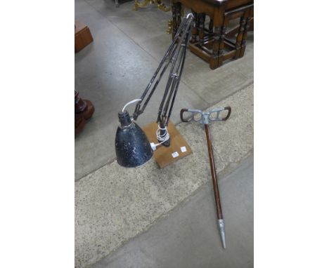 An anglepoise lamp and shooting stick