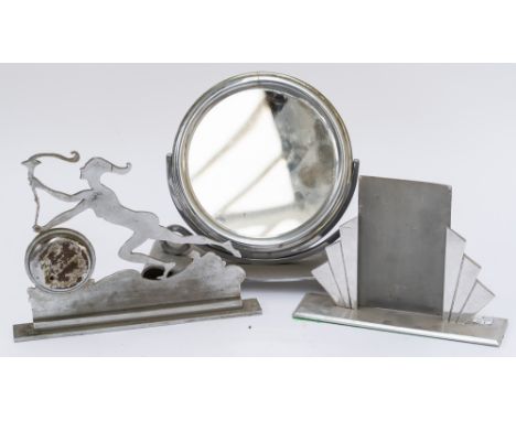 A CHROME PLATED DRESSING TABLE MIRROR (3)The circular plate to both sides, scroll base, stamped  BR II TEX Reg. MADE IN ENGLA