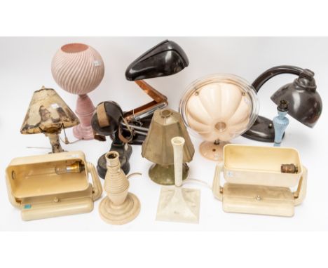 ELEVEN BAKELITE AND PLASTIC TABLE LAMPS AND A TABLE FAN (12)Circa 1930s/40s One Bakelite helmet shaped shade, hinged arm, sta