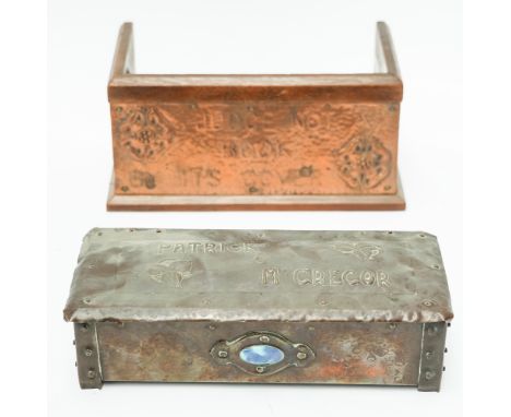 A SPOT HAMMERED COPPER TOBACCO BOX AND AN ARTS & CRAFTS COPPER MOUNTED OAK BOOK TROUGH (2)The tobacco box with PATRICK & MCGR