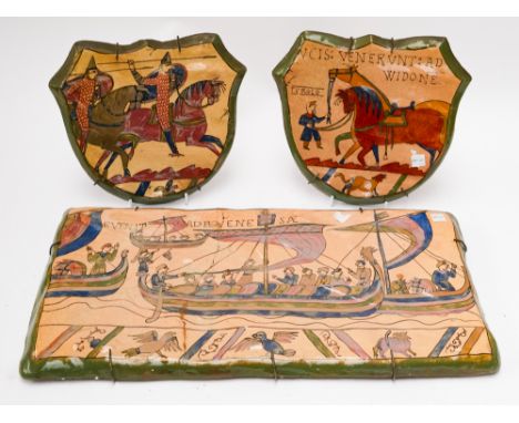 LOUIS ETIENNE DESMANT (FRENCH 1844-1902): A RECTANGULAR POTTERY PANEL AND A PAIR OF SHIELD SHAPED PANELS (3)Each depicting sc