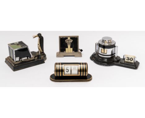 AN ART DECO CHROME PLATED AND BLACK ENAMEL ‘ODEON’ BAROMETER AND TWO PERPETUAL CALENDARS (4)With barrel shaped dial with uppe