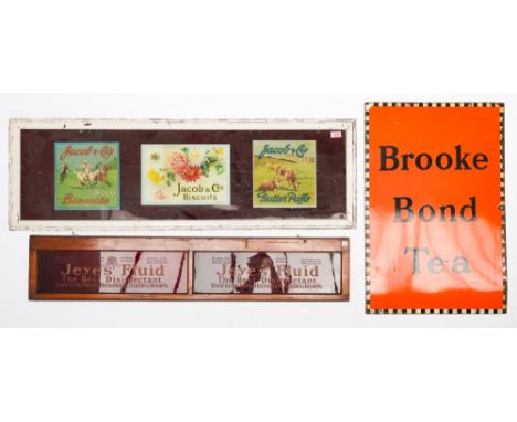 TWO FRAMED GLASS ADVERTISING SIGNS AND AN ENAMEL SIGN (3)The framed signs for Jacobs & Co. Biscuits, 123cm wide, and Jeyes’ F