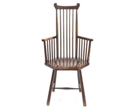 AN ARTS &amp; CRAFTS STAINED WOOD COMB BACK WINDSOR CHAIR WITH DISHED HEXAGONAL SEAT, C1910, 108CM H, STAMPED 1365