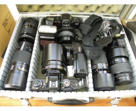 TWO MINOLTA 35MM X-700 AND 7000 CAMERAS, A MINOLTA DYNAX 7000I CAMERA AND VARIOUS ACCESSORIES, INCLUDING MOTOR DRIVE AND MINO