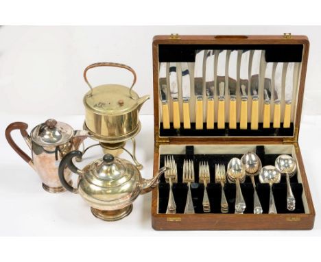 AN EPNS TABLE SERVICE, OLD ENGLISH PATTERN, IN OAK CANTEEN, AN EDWARDIAN PLATED SPIRIT KETTLE ON LAMPSTAND, A TEAPOT AND HOT 