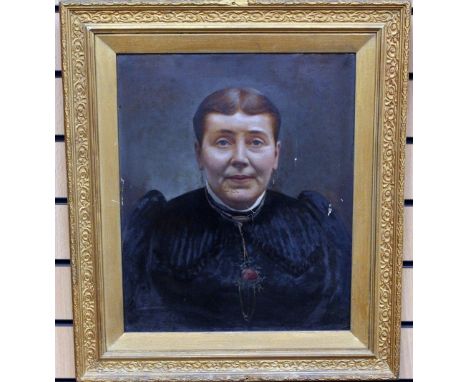 A Victorian portrait of a lady, oil on canvas, unsigned, fitted in a gilt frame, 60 cm x 52 cm wide