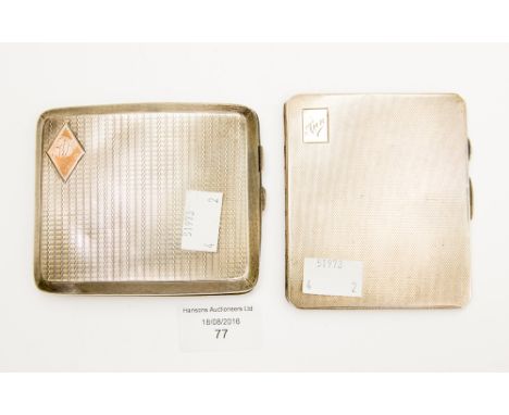 Two silver engine turned cigarette cases, one Birmingham 1946, inscribed 1950, gilt lined, the other marked Chester 1924, tot