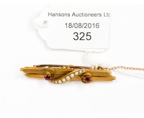 A Victorian seed pearl and ruby set, 15 ct gold, bar brooch, hallmarked Chester 1897