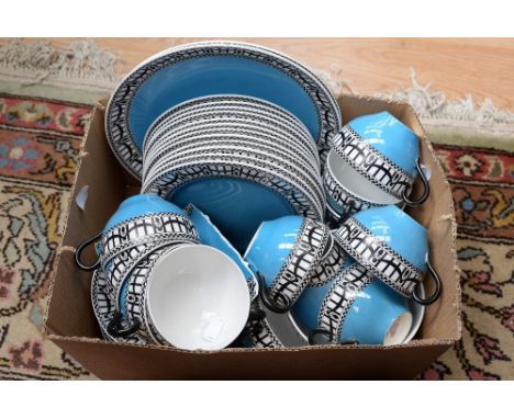 A Royal Worcester twelve plate tea service, comprising cups, saucers, side plates, decorated with black swag and bands with b
