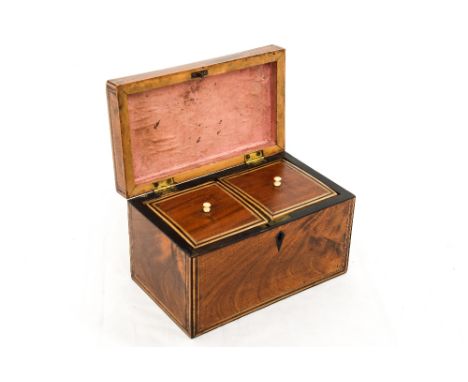A George III, flame mahogany tea caddy with stringing