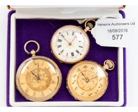 Three 14 ct gold engine turned gold hunters, one having enamelled dial (3)