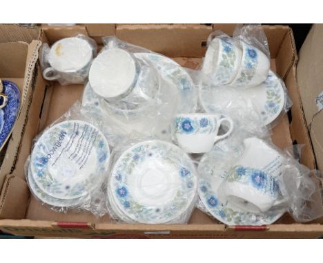 A Wedgwood 'Clementine' teaset comprising of six cups,six saucers, six side plates, milk jug, sugar bowl and cake plate 