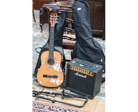 A cased Admira Spanish guitar, with a cased Lorenzo guitar, two guitar stands, and a Marshall amplifier (5)