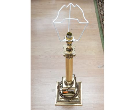 AUCTIONEER TO ANNOUNCE THIS ITEM HAS PASSED ITS PAT TEST****A modern brass column table lamp