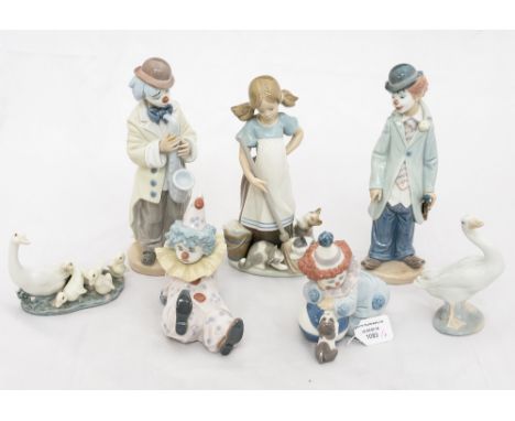 A group of seven Lladro figures, including two clown musicians