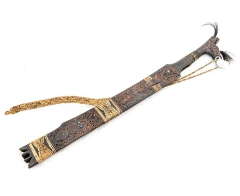 A Maori sword and scabbard, bead inlaid carvings, plated and woven work, possibly 19th Century  