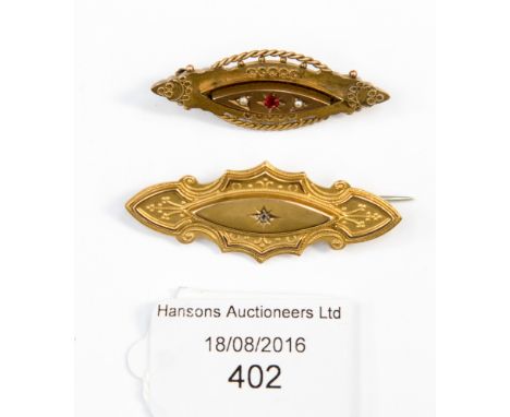 Two 19th Century 9 ct gold, 0.375 mourning brooches, one set with a ruby and two seed pearls and the other a small diamond, g