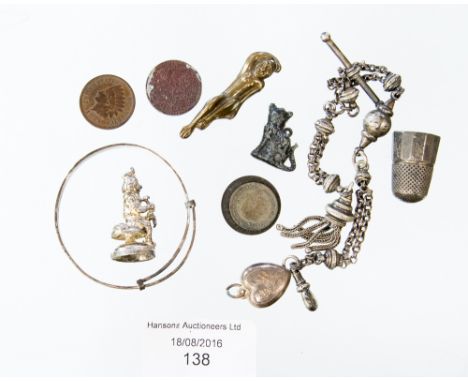 A bangle, marked silver, a 19th Century thimble with indiscernible London hallmark, a white metal 0.89 ozt fancy Albert chain