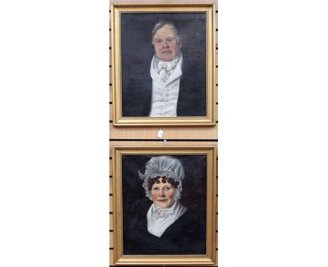 A pair of portraits, comprising a mid 19th Century British School, head and shoulders portrait of a lady and gentleman, oil o