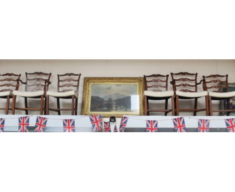 A set of six early 20th Century Chippendale style mahogany dining chairs, of ladder back form, comprising two armchairs and f