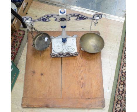 A pair of 1960s decorative scales together with a late 1930s pastry board 