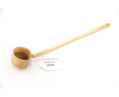 An early 19th Century Scottish whalebone toddy ladle
