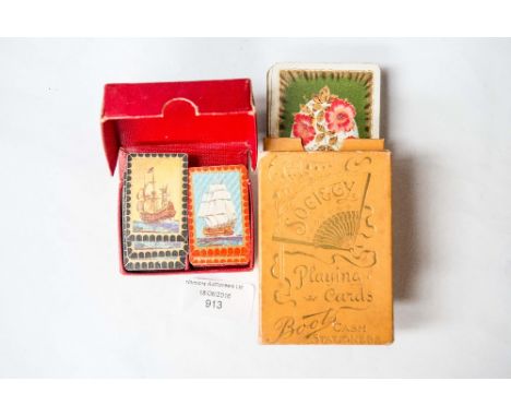 A pack of Society playing cards and a box of patience cards (2)