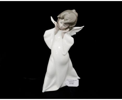 A Lladro figurine of an angel