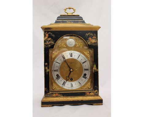 An Elliott bracket clock of 18th Century design, circa 1950s, black lacquer case with Chinoiserie decoration of pagodas and f