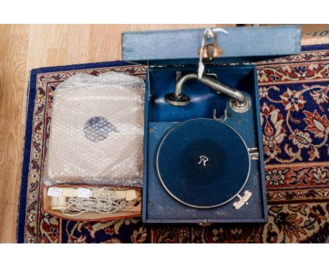 An 'His Masters Voice' circa 1920 portable wind up record player, plus 78" records and also an electric pick up