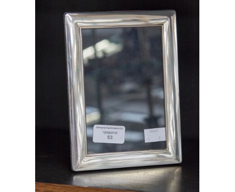 A silver wooden backed easel photograph frame, hallmark Sheffield 1998