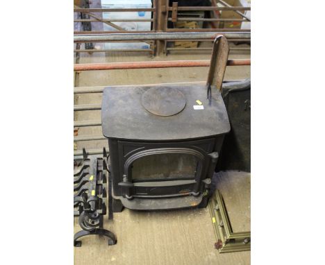 A cast iron effect electric log burner, sold as collectors item