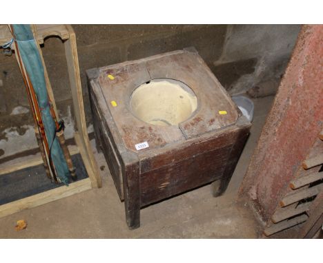 A vintage wooden commode 