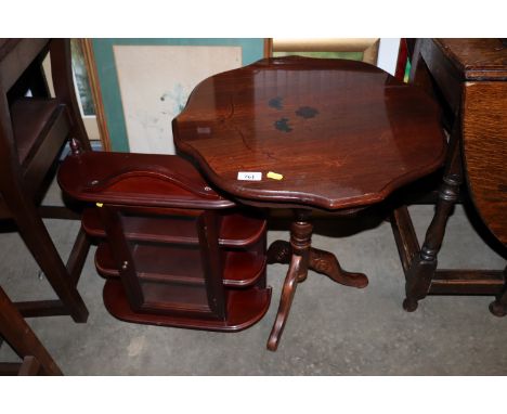 An inlaid occasional table raised on tripod base and wall mounting display cabinet