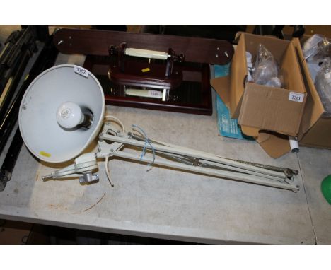 An Angle Poise style lamp sold as a collectors item