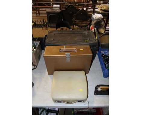 A small metal storage trunk, a metal case filing box and a cased Olympia Splendid 33 typewriter
