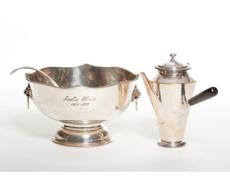 A SILVER-PLATE PUNCH BOWL, with lion mask and ring handles, with gadroon edge and stem base, 13" (33cm); a kings pattern ladl