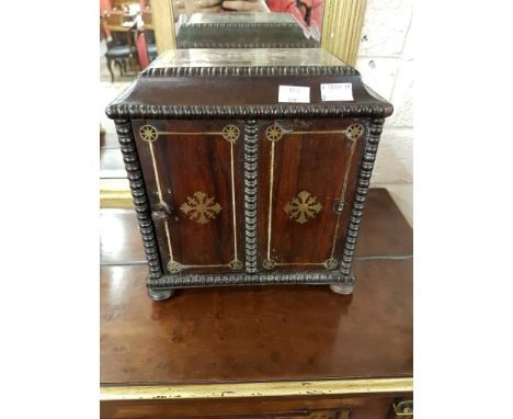 A WILLIAM IV PERIOD BRASS INLAID ROSEWOOD SPECIMEN CHEST, the front door with two brass inlaid panels, opening to reveal four