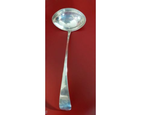 AN IRISH PROVINCIAL SILVER CRESTED SOUP LADLE, by Carden Terry and James Williams Cork 1087-1921, the taper pattern handle wi